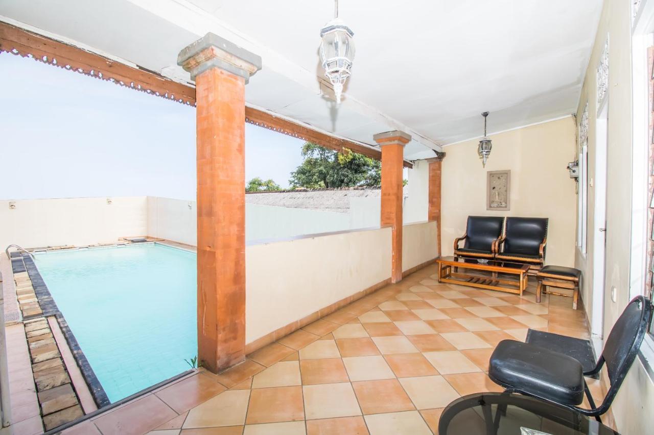Oyo 3134 Puri Tamu Hotel جيمباران المظهر الخارجي الصورة
